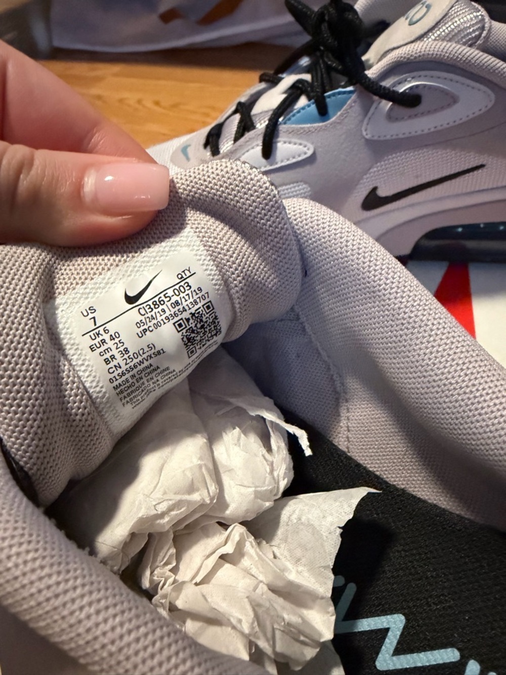 Nike White and Light Blue Low-Top Sneakers with Black Accents - Picture 3 of 4